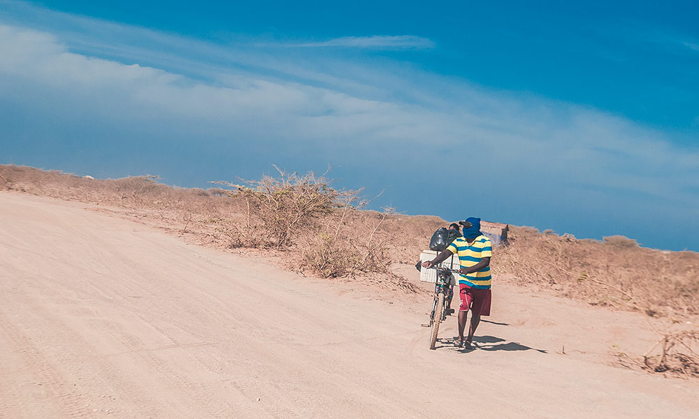 A Wayuu vendor on his way to work in Cabo de la Vela, Playa Dorada